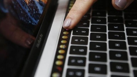 Touch Bar eski MacBook'lara geldi!